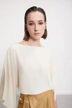 Blouse fluide avec amples manches