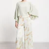 Blouse fluide avec amples manches