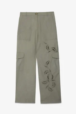 Pantalon en coton avec broderie à oeillets